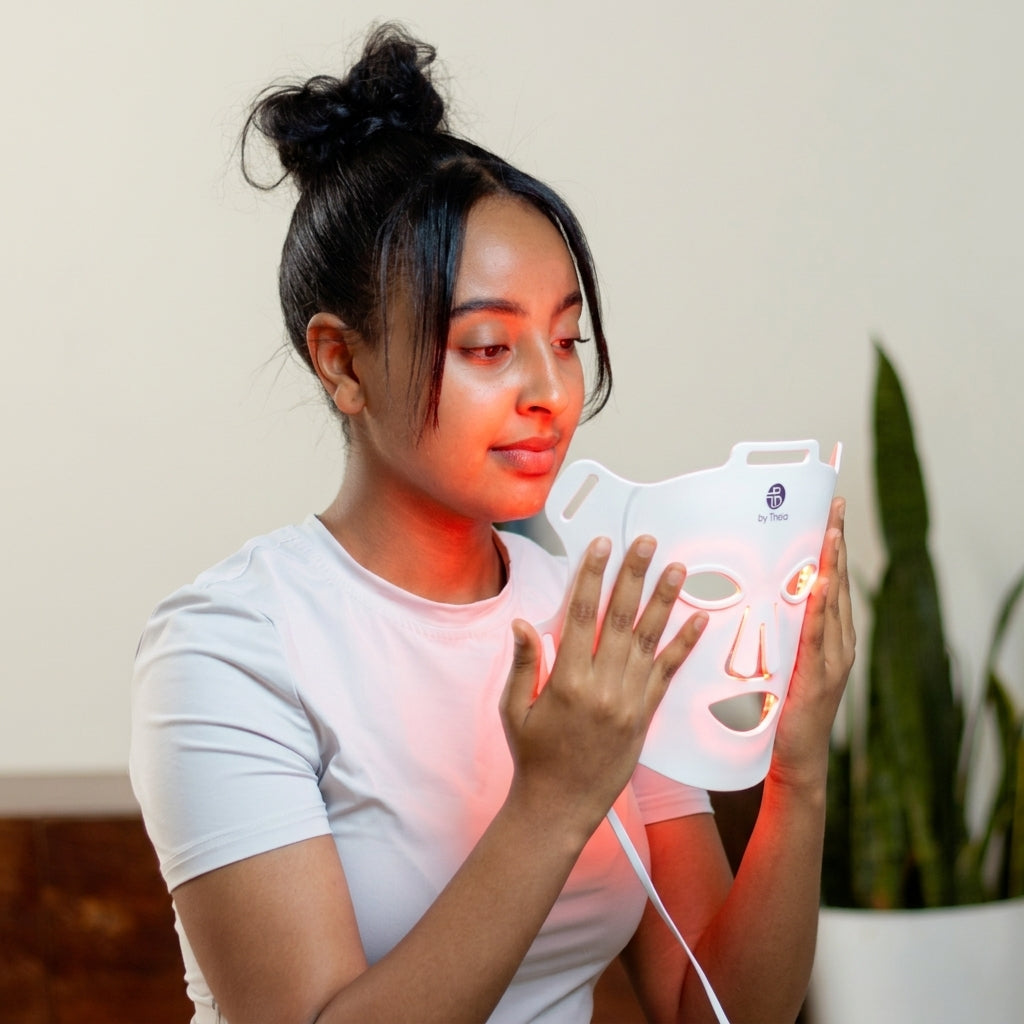 How to use byTheia Advanced LED light therapy mask step 2 - unfold foldable medical-grade silicone mask and secure with adjustable buckle for hands-free fit