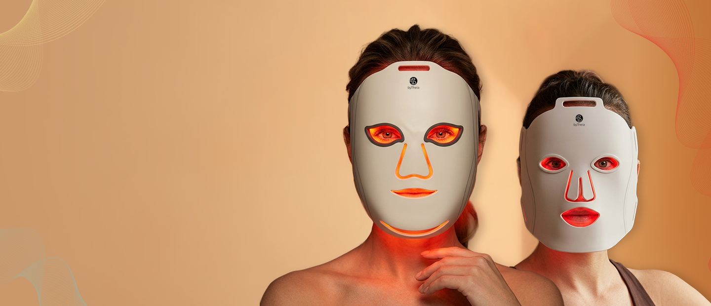 Two people wearing bytheia LED face masks on a beige background