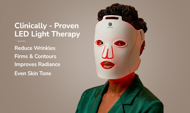Woman wearing byTheia LED face mask in red light therapy mode - ten minutes three to five times a week for visible skin results in six weeks Canada