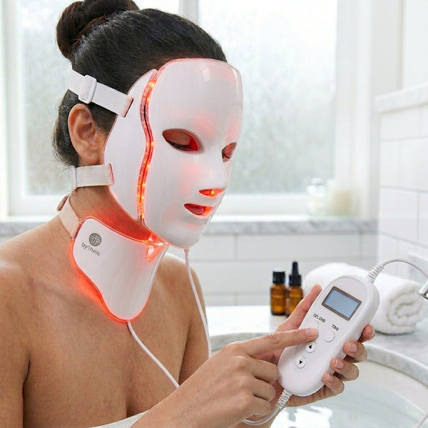 How to use byTheia LED face and neck mask step 3 - use wired controller to select wavelength mode and adjust
brightness from 9 levels