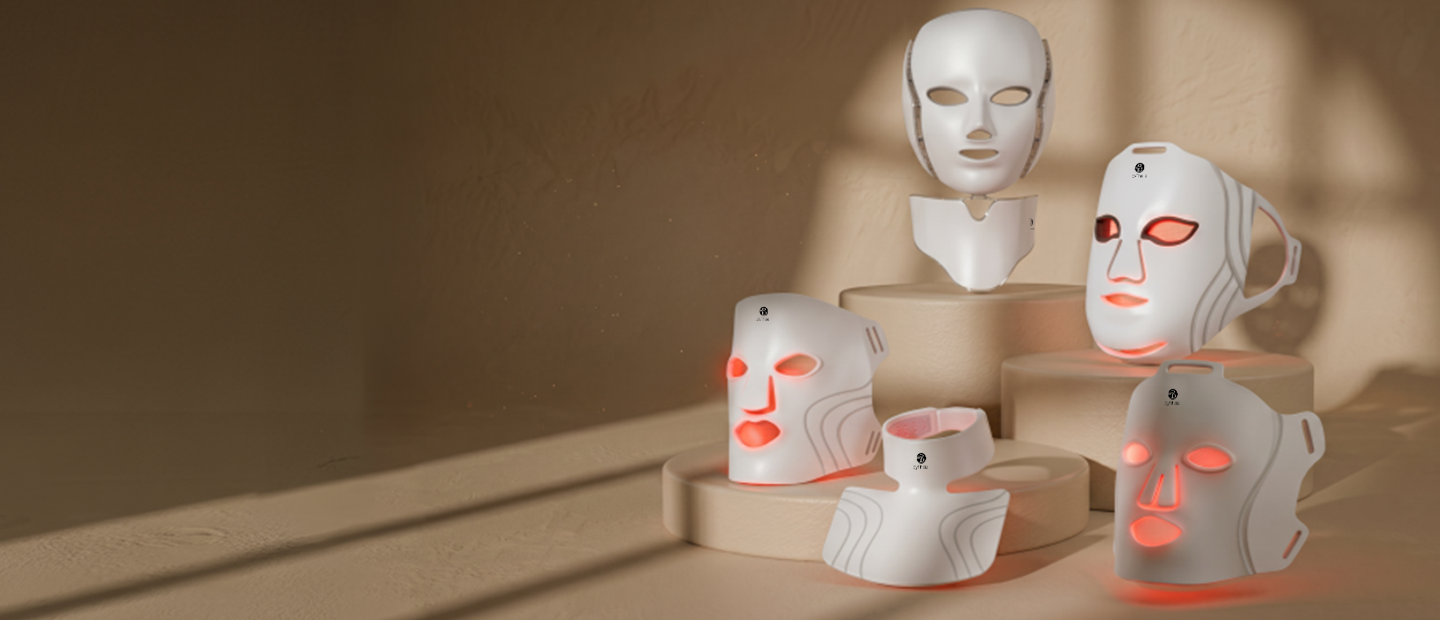 Set of LED facial masks with illuminated display on a wooden shelf